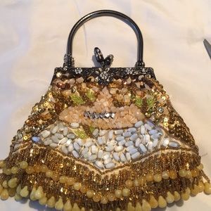 Yellow spangle in multi colored stone purse